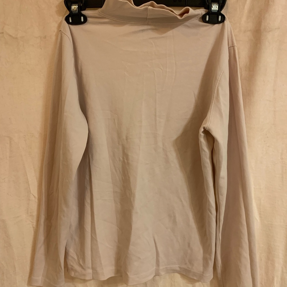 light pink turtleneck